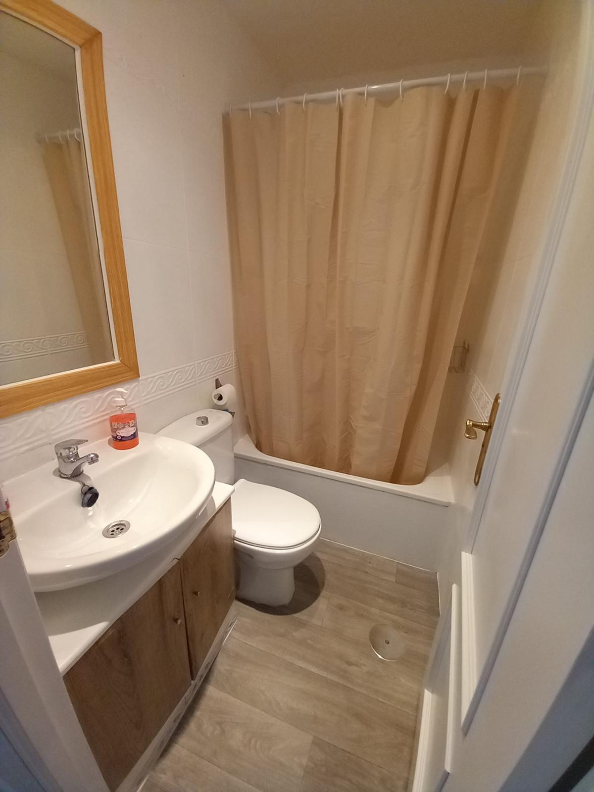 Cuarto de baño con bañera