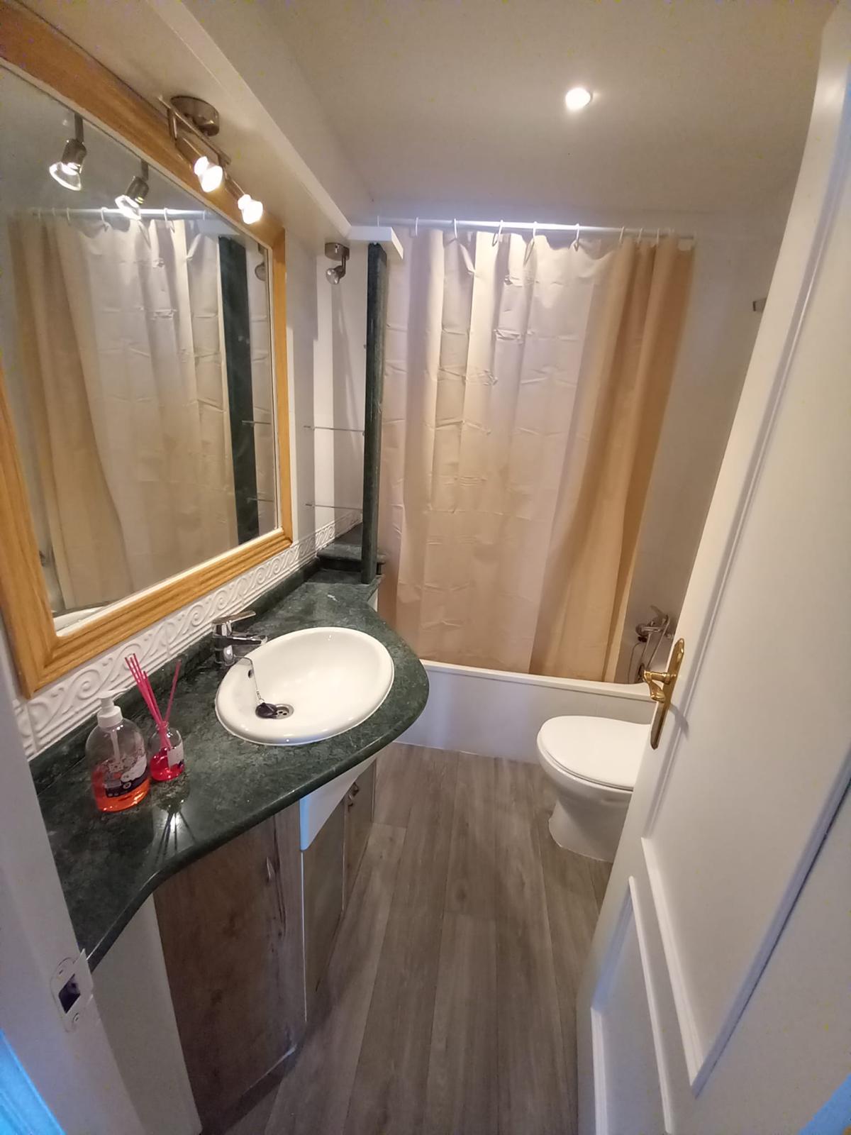 Cuarto de baño con ducha